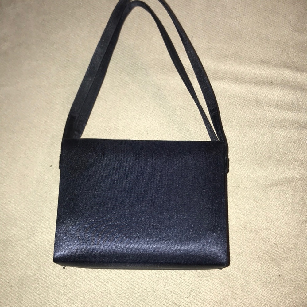 La Regale satin hand bag.